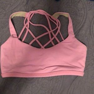 Pink Lululemon Free to be Strappy sports bra.